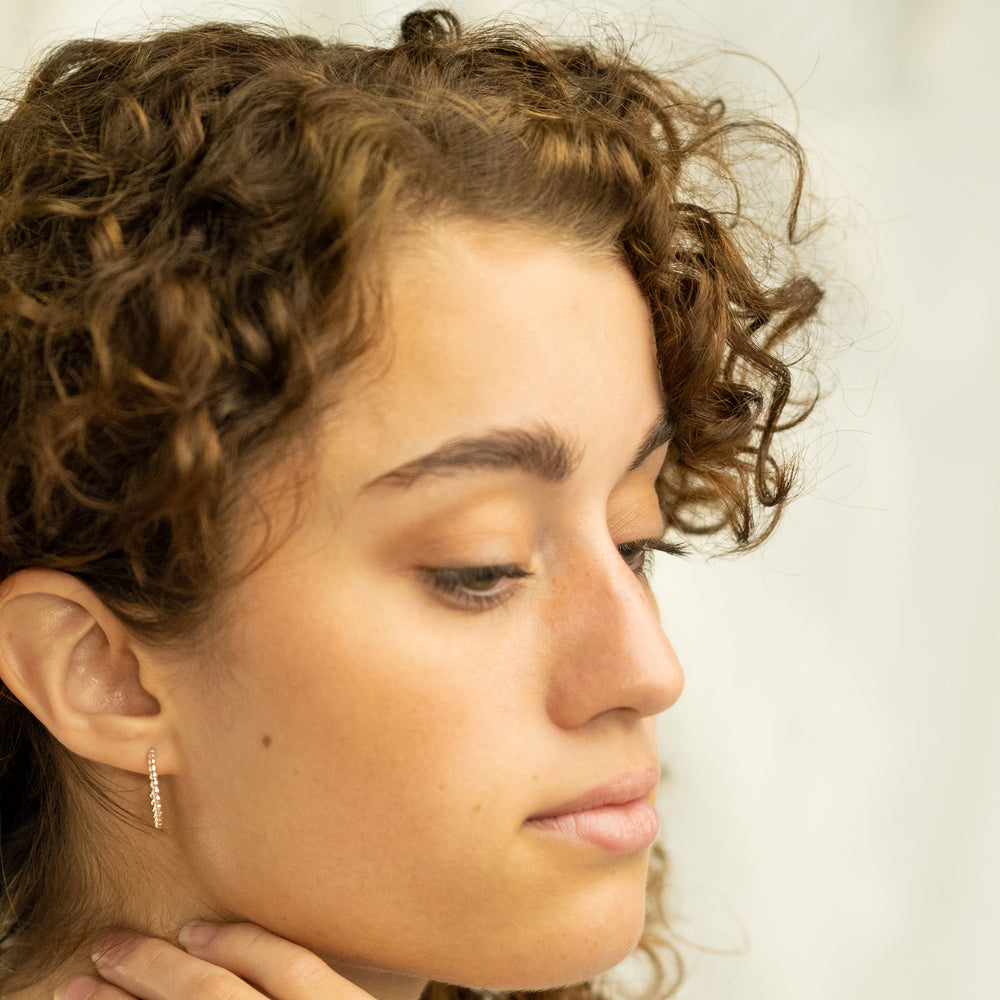 
                      
                        Ball Hoop Earrings
                      
                    