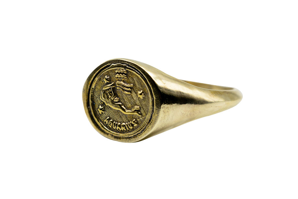 Vintage Brass Astrology Ring. Can be changed to Gold. This ring has Zodiac Aquarius. Handmade in a jewelry store in Brooklyn NYC