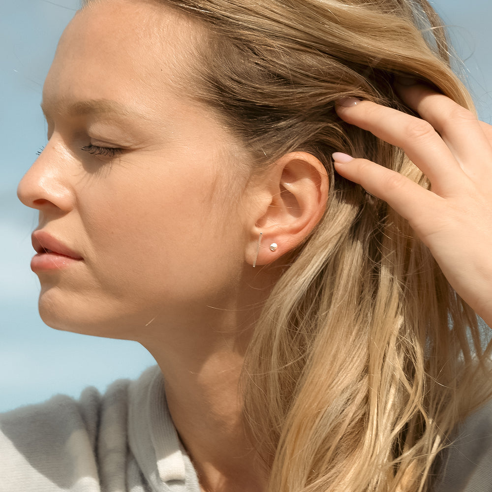 
                      
                        Ball Stud Earrings
                      
                    