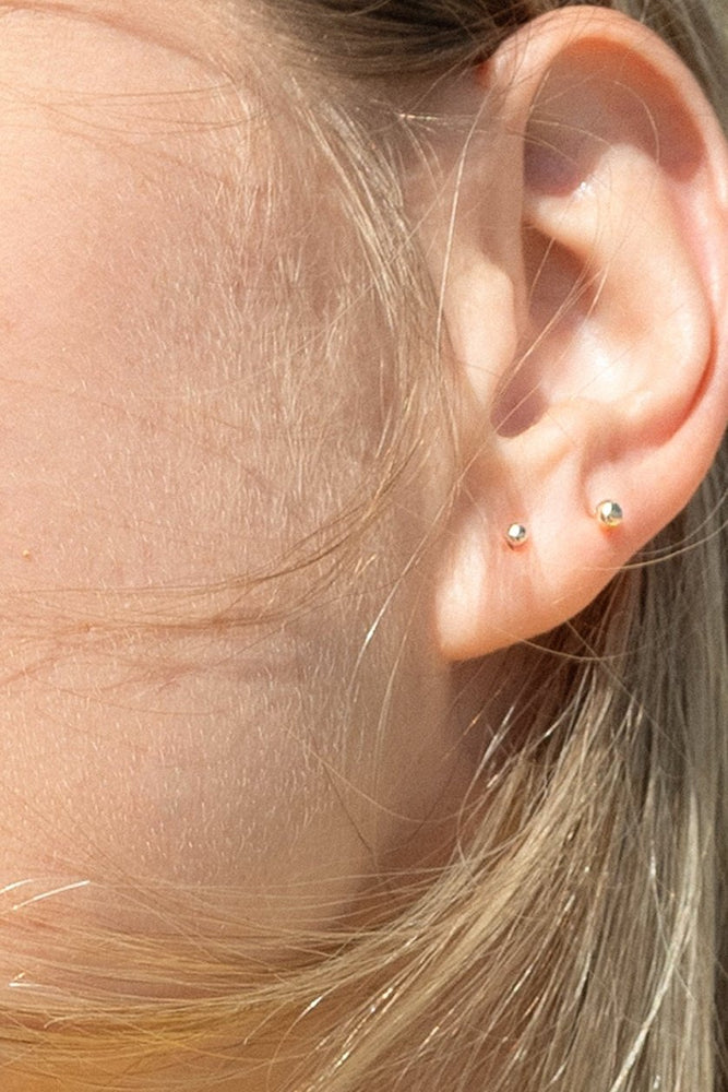 
                      
                        Ball Stud Earrings
                      
                    
