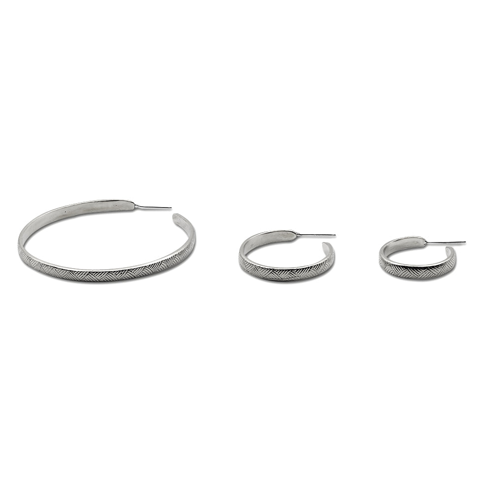 Vintage inspired lines hoop earrings in sterling silver. Custom Handmade by jewelers in Brooklyn, NY.