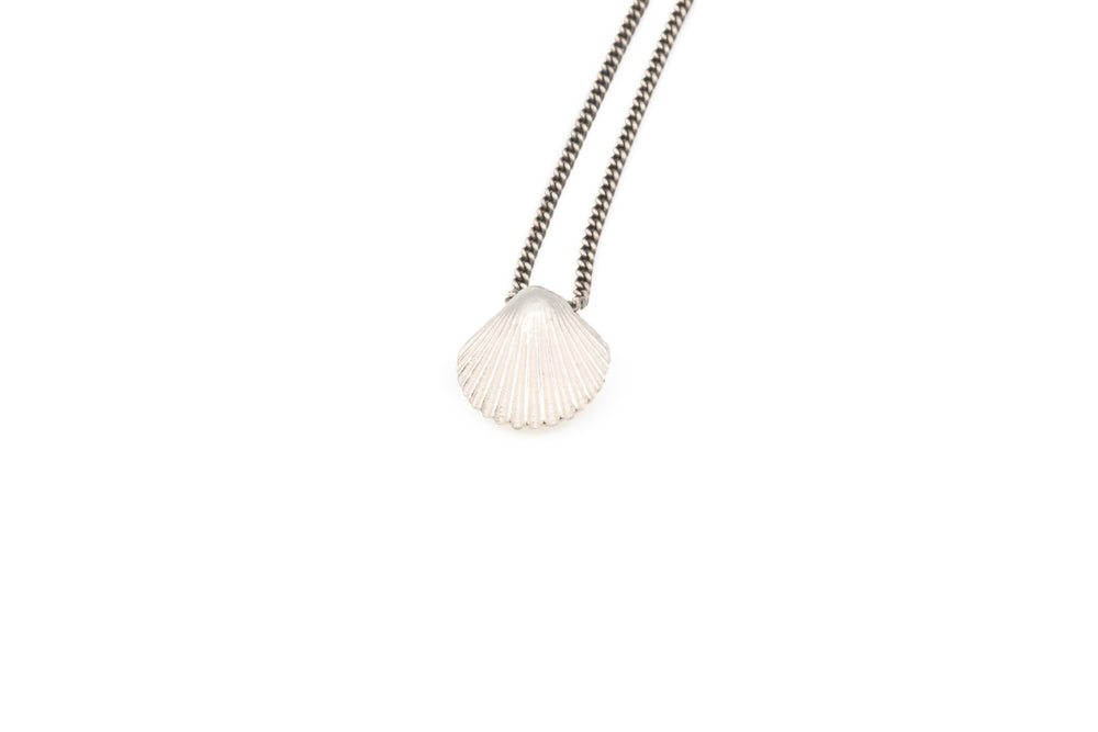 Simple Vintage Inspired Scallop shell Necklace in solid Sterling Silver. Jewelry on an oxidized Silver chain for marine research. Handmade vintage jewelry made in Brooklyn NYC