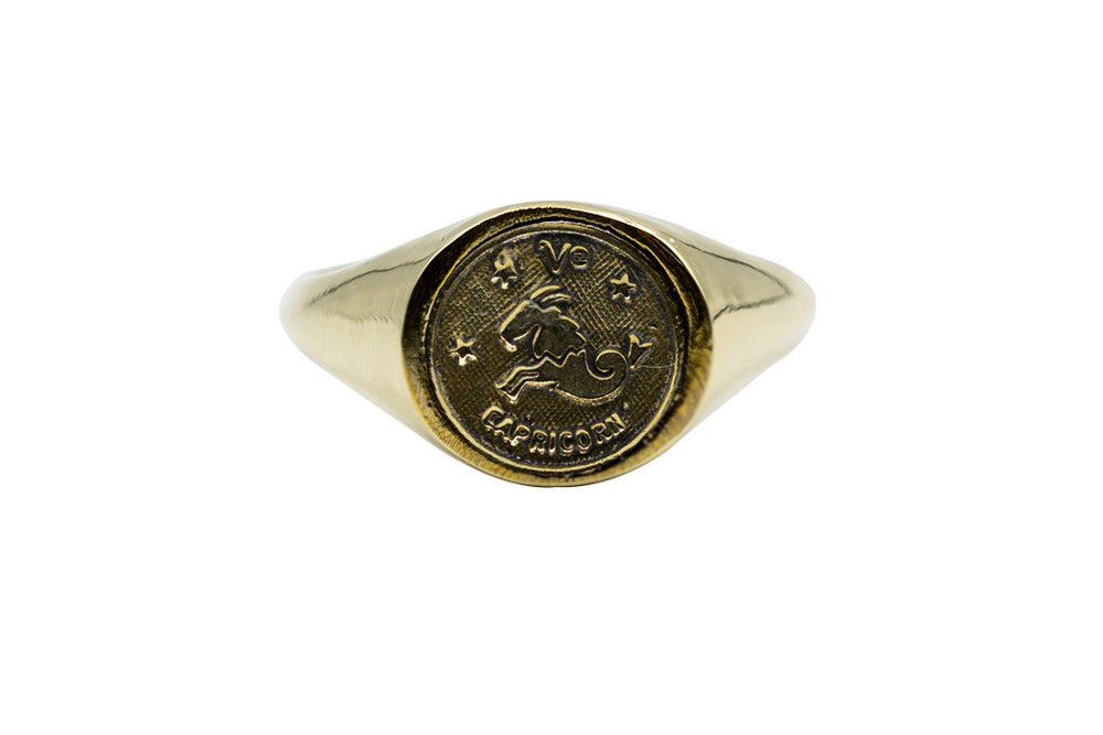 
            
                Load image into Gallery viewer, Vintage Brass Astrology Ring. Can be changed to Gold. This golden ring has Zodiac Capricorn. Handmade in a jewelry store in Brooklyn NYC
            
        