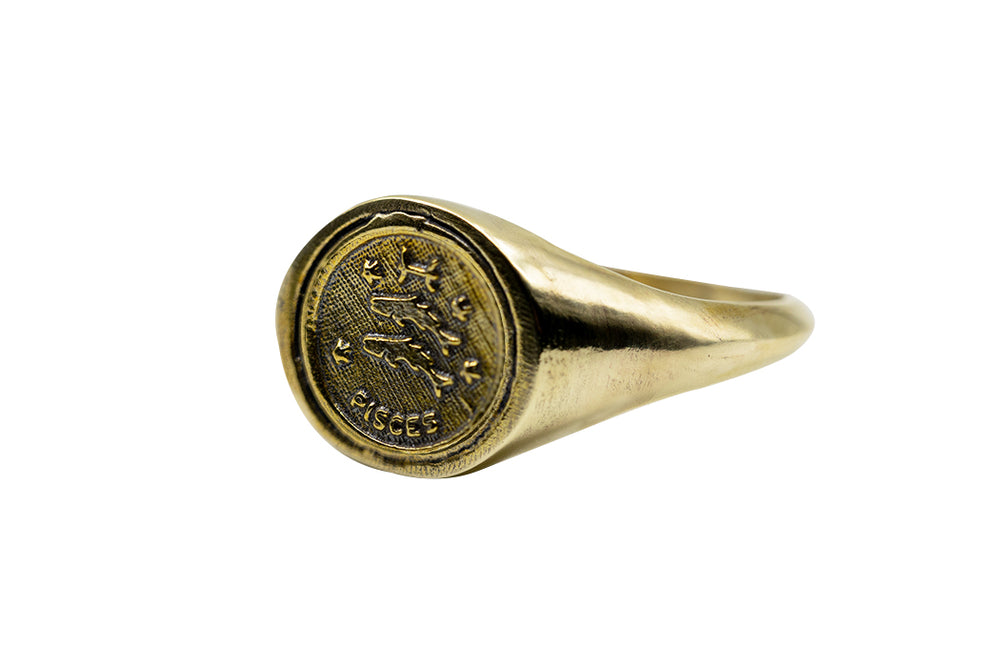 
            
                Load image into Gallery viewer, Vintage Brass Astrology Ring. Can be changed to Gold. This golden ring has Zodiac Pisces. Handmade in a jewelry store in Brooklyn NYC
            
        