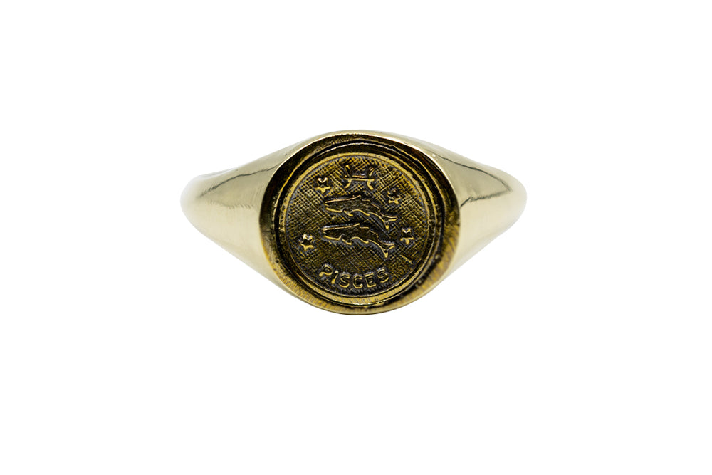 
            
                Load image into Gallery viewer, Vintage Brass Astrology Ring. Can be changed to Gold. This golden ring has Zodiac Pisces. Handmade in a jewelry store in Brooklyn NYC
            
        