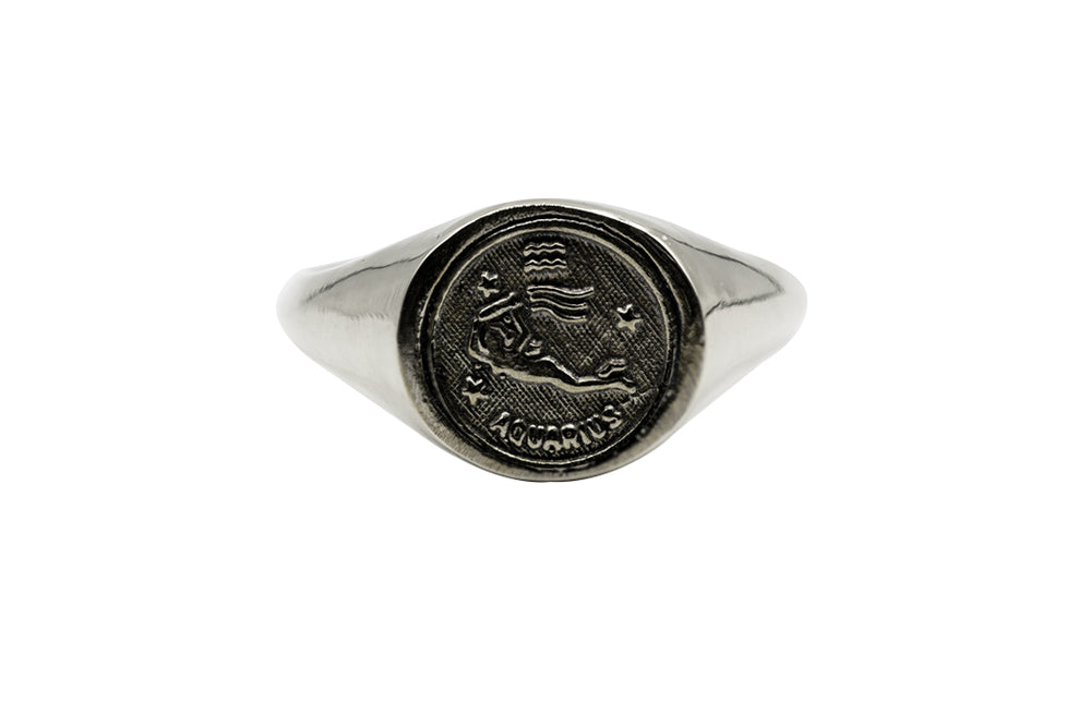 An Astrology Ring with Zodiac Aquarius. Piece of Men and Women Jewelry in Silver