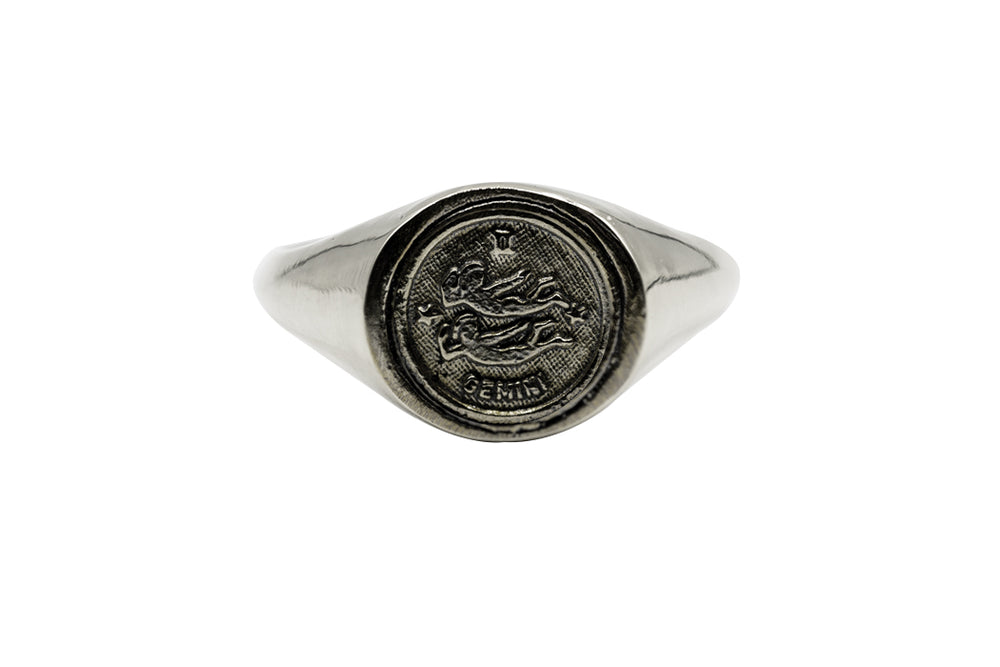 
                      
                        An Astrology Ring with Zodiac Gemini. Piece of Men and Women Jewelry in Silver
                      
                    