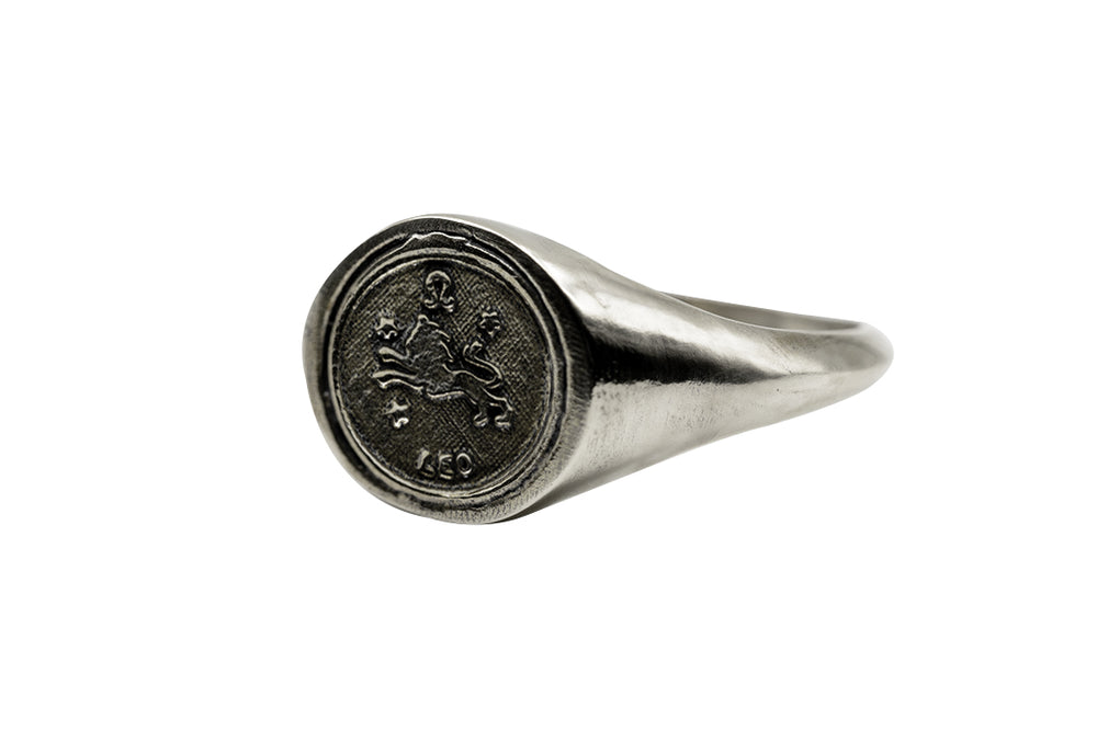
                      
                        An Astrology Ring with Zodiac Leo Side view. Piece of Men and Women Jewelry in Silver
                      
                    