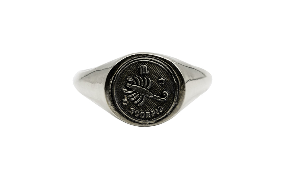 
                      
                        An Astrology Ring with Zodiac Scorpio. Piece of Men and Women Jewelry in Silver
                      
                    