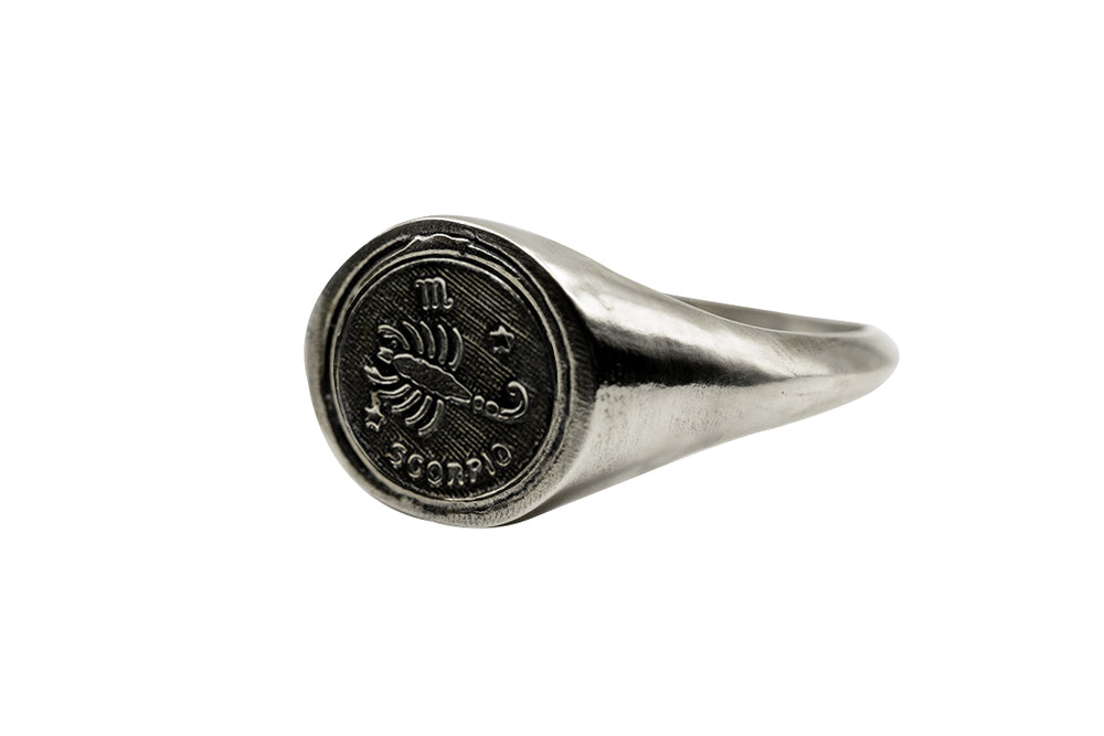 
                      
                        An Astrology Ring with Zodiac Scorpio Side view. Piece of Men and Women Jewelry in Silver
                      
                    