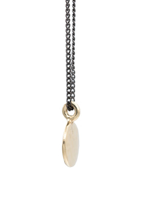 
            
                Load image into Gallery viewer, Vintage Simple Hammered Circle Charm Necklace made of gold plated solid brass giving it a beautiful golden look. The pendant charm is on an oxidized brass chain. Hand made by jewelers in Brooklyn New York
            
        