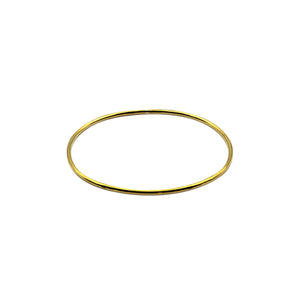 Classic Simple Vintage Thin Hammered Bangle Bracelet made of solid brass.  This golden custom Jewelry is handmade by a jeweler in Brooklyn NYC
