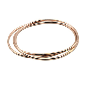 Vintage Classic Hammered Thin Bangle Bracelet made of 14k Rose Gold. Custom Handmade by jewelers in Brooklyn, NY.