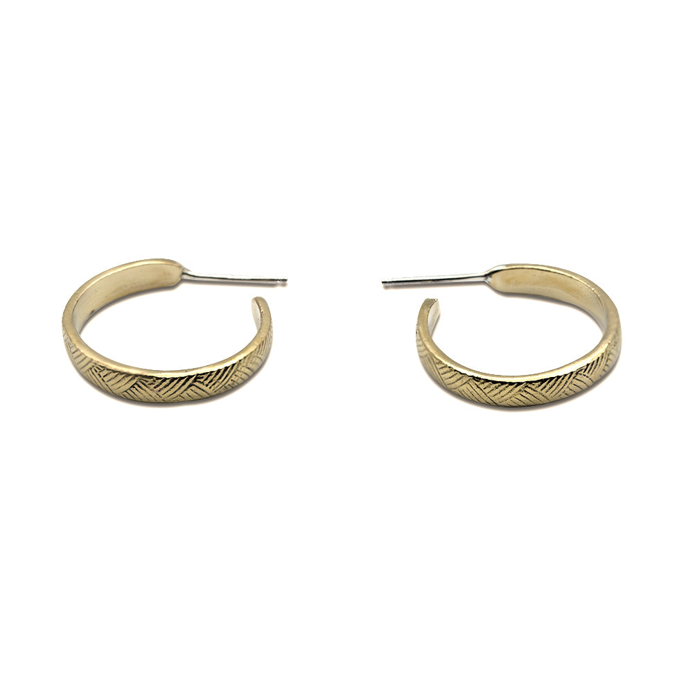 
            
                Load image into Gallery viewer, Vintage inspired lines hoop earrings in solid brass with sterling silver posts. Custom Handmade by jewelers in Brooklyn, NY.
            
        