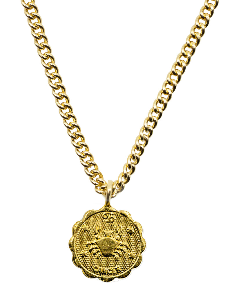 
            
                Load image into Gallery viewer, Gold plated Brass coin shaped pendant with unique scalloped edge Astrology Pendant Necklace on chain. Zodiac Cancer. Handmade in Brooklyn NYC
            
        